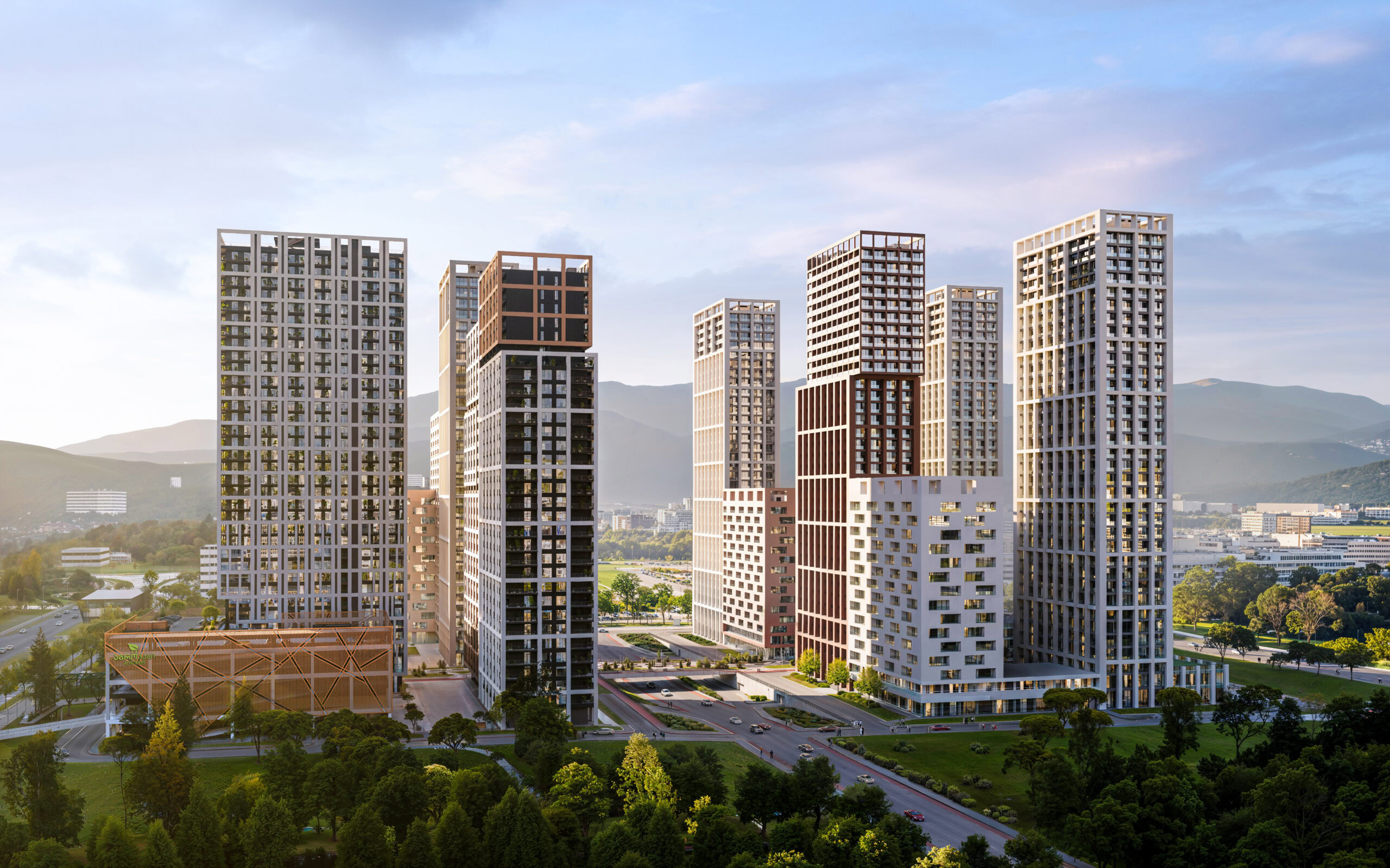 High-rise buildings in a cityscape with modern architecture and green surroundings.
