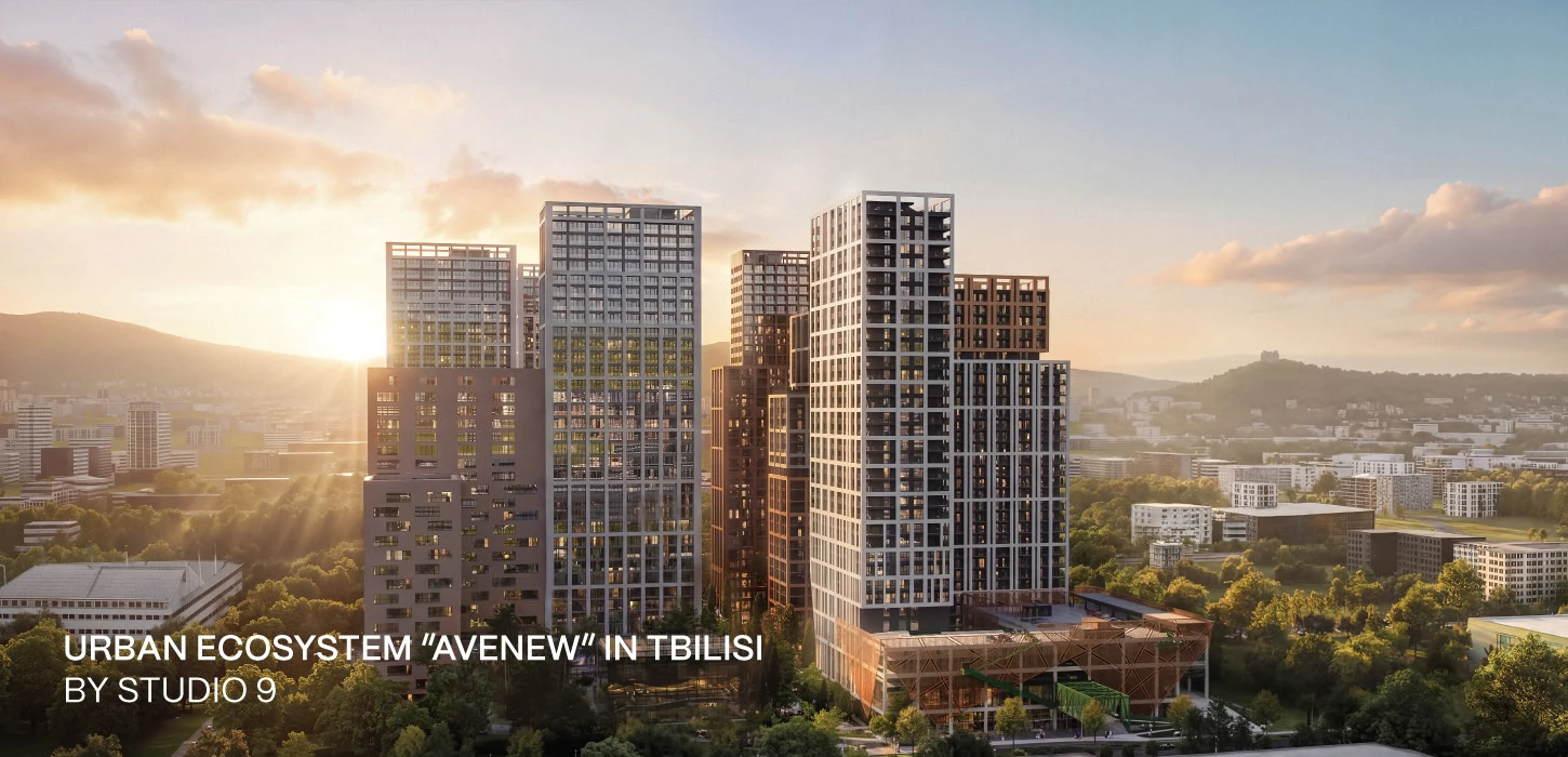 Modern high-rise buildings in Tbilisi with sunset background.